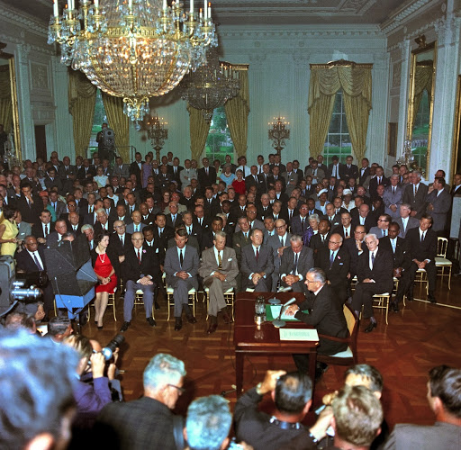 President Lyndon B. Johnson speaks to the nation before signing the Civil Rights Act