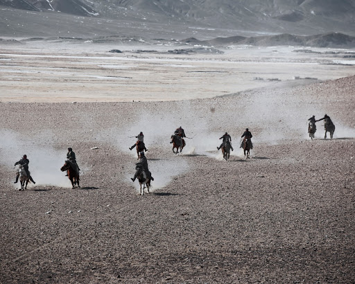 Kazakhs riding Mongol horses, Bayan Olgii, Mongolia