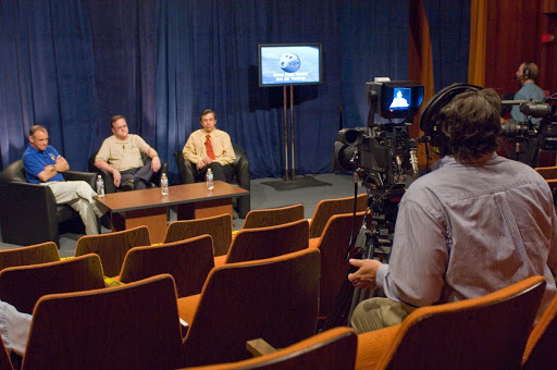 NASA Officials gather at Ames Research Center to discuss Spaceship development progress.