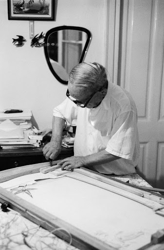 Writer Yiannis Skaribas preparing a shadow puppetry performance