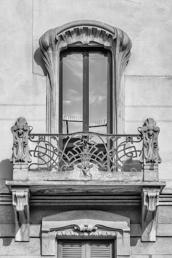 Building. art nouveau apartment building at 14 via Pisacane, Milan, Italy