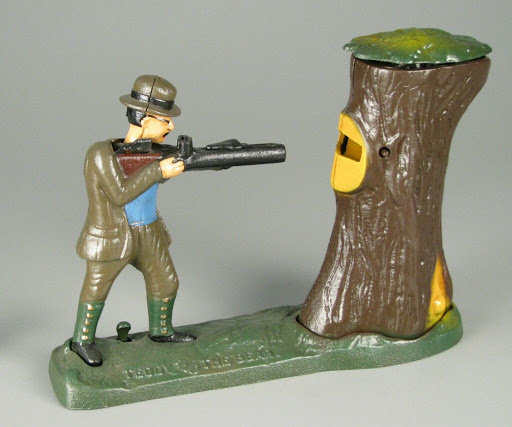 Mechanical bank:Teddy and the Bear