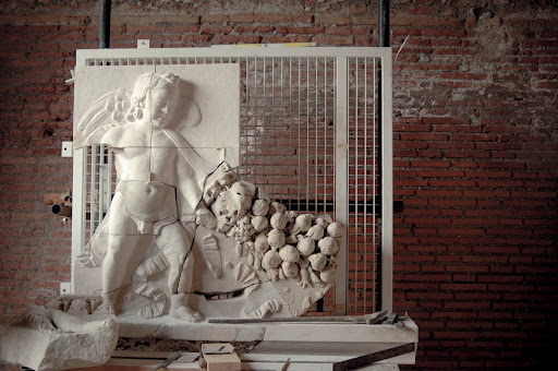 Reconstruction of a relief with Cupids and garlands, from the external decoration of the Temple of Venus Genetrix in the Forum of Caesar (during reconstruction work in 2007)