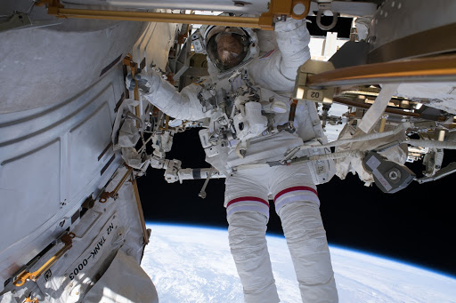 NASA astronaut Ricky Arnold is pictured during a spacewalk he conducted with fellow NASA astronaut Drew Feustel out of frame.