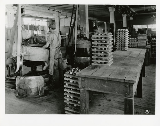 Billiard balls ground on a merry-go-round