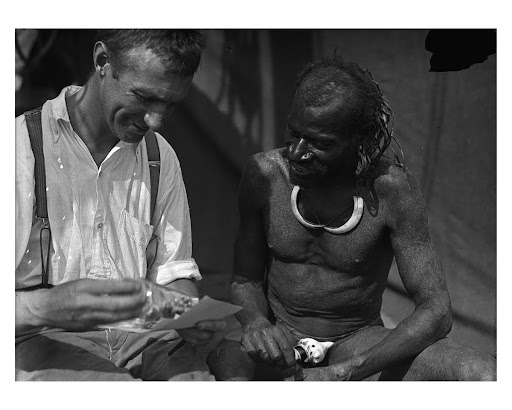 Allan McCulloch and a Dukoif man on board the Eureka, Lake Murray, Western Province, 23 November 1922