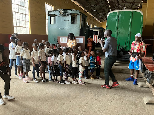Children line up for their pump trolley ride at Railway Museum