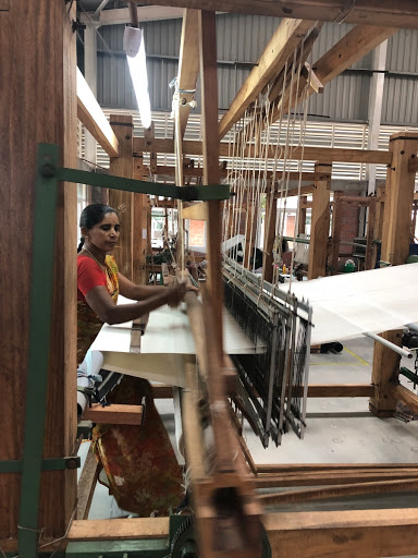 Artisan weaving fabrics in the Oshadi workshop