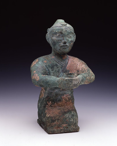 Bronze kneeling figure