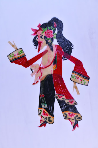 Rooster-footed deity