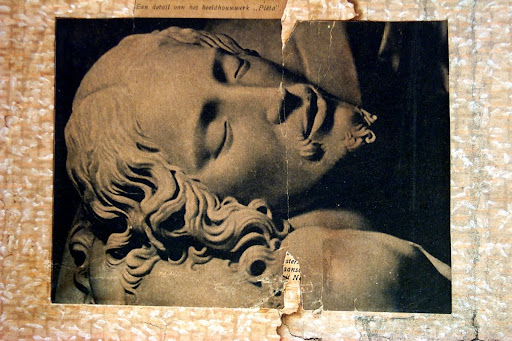 Pieta, pasted on the wall on top of the picture of the Lane sisters.