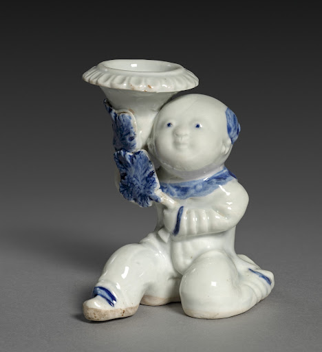 Kneeling Boy Holding a Vase