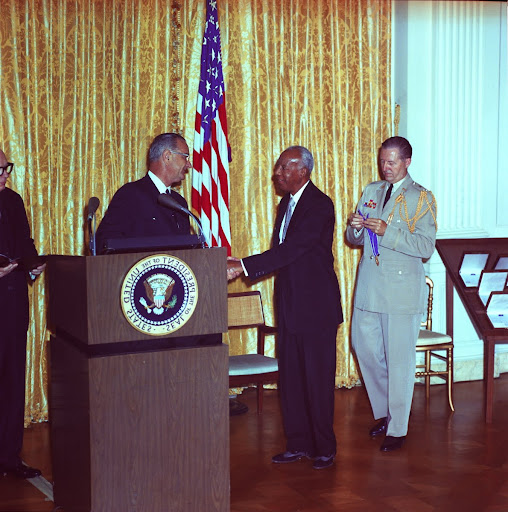 President Lyndon B. Johnson awards the Medal of Freedom to A. Philip Randolph.