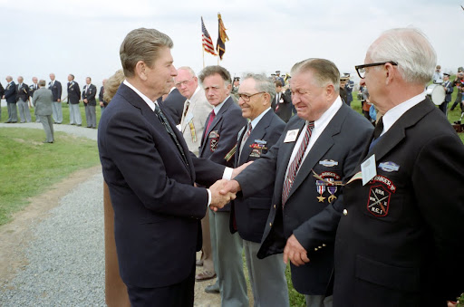 President Reagan with former U.S. Rangers at Pointe du Hoc, Normandy, France. 6/6/84.