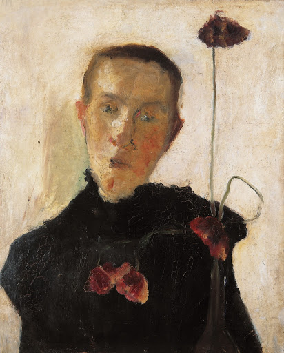 Portrait of a woman with poppies