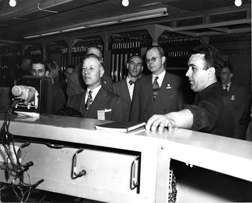 Ralph J. Cordiner, president of the General Electric Company, during his April 26, 1951 inspection visit to the company's expanding turbojet and turboprop center at Lockland Ohio.