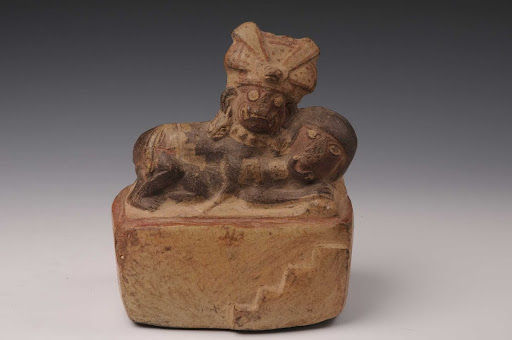 Sculptural ceramic ceremonial vessel that represents the sexual union of Ai Apaec and a mythological woman ML004211