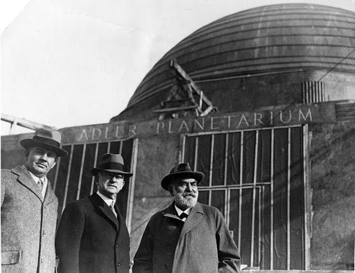 Max Adler, Philip Fox, and a third man outside the Adler Planetarium