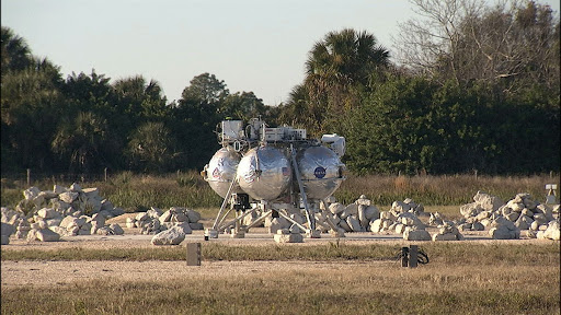 NASA's Project Morpheus prototype lander comes to rest after a successful landing capping free flight test No. 15.