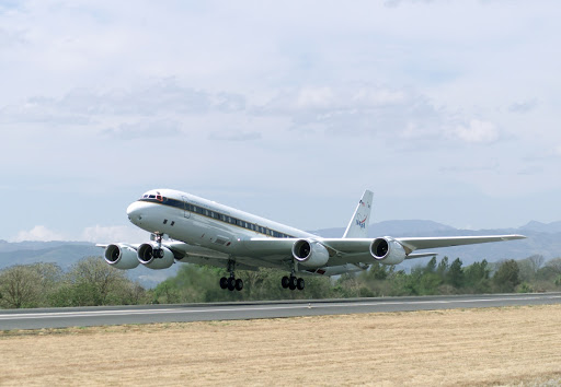 NASA's DC-8 flying laboratory takes off from Juan Santamaria International Airport in San Jose, Costa Rica, on NASA's AirSAR 2004 campaign