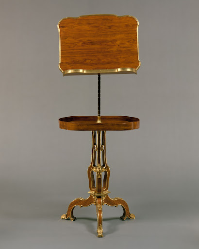 Adjustable reading and writing table (pupitre à crémaillère, servant de table)