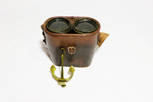 Field Glasses and model of stockless anchor from HMAS Sydney