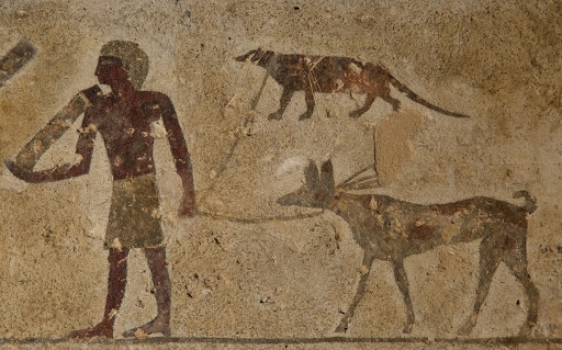 Wall decoration of man and two animals