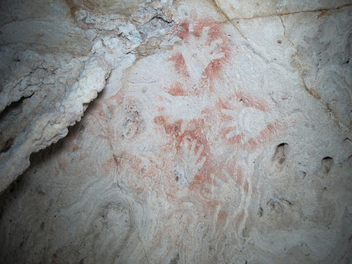 A group of hand stencils at Ham Cave, East Borneo