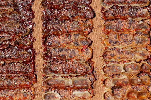 Propolis coated inner walls of the beehive