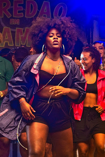 Passinho's dancer poses at baile funk