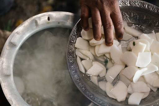 Turnip is added to a pot of boiling water in Ranipur