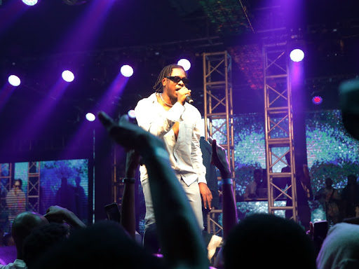 Runtown performs onstage