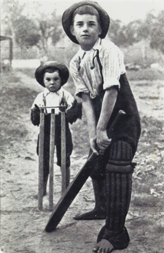 Boys Playing Cricket