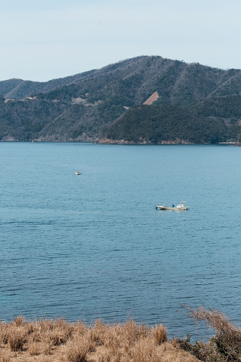 Fishing boat floating in Wakasa bay