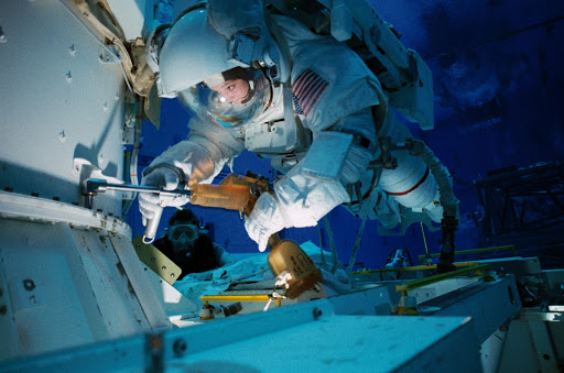 Astronauts Tamara Jernigan and Daniel Barry train in the NBL for STS-96