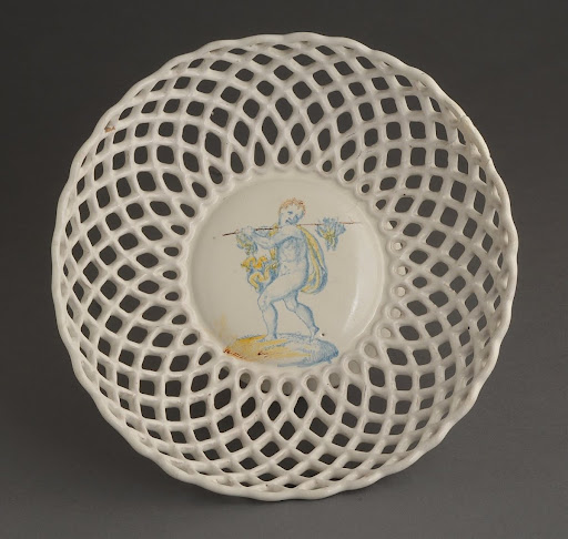 Cup with fretwork decoration of a young fowler