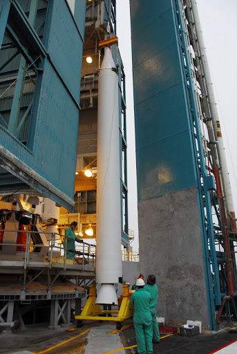At Vandenberg Air Force Base in California a crane is used to hoist up a solid rocket motor for the United Launch Alliance Delta II.
