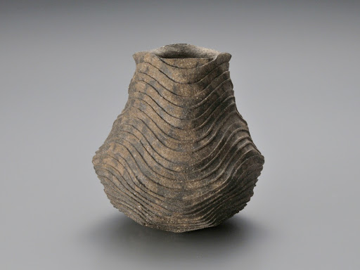 Vase with carved lines
