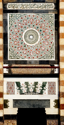 Restored marble panel on the facade Aslam al Silahdar