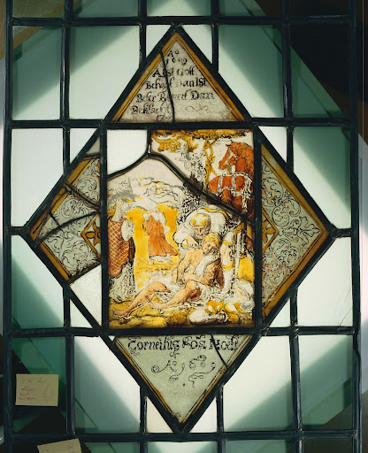 Ruit met de barmhartige Samaritaan die de gewonden helpt met onderschrift "Corneilus van Hoeff Ao 1609"