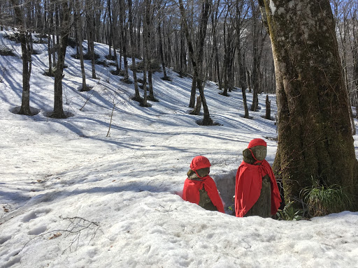 Mitarashi Jizo Statues standing silently in the snow