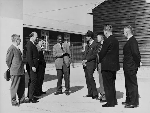 Robert Sobukwe with Press on arrival at Robben Island