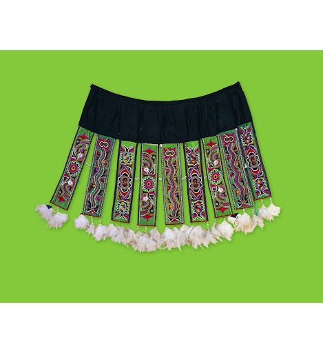 Woman's Skirt Decorated with Colored Ribbons and Chicken Feathers