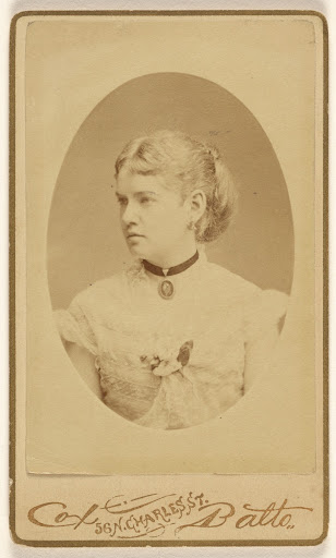 [Unidentified woman with cameo around her neck, in profile, printed in oval format] (Main View)