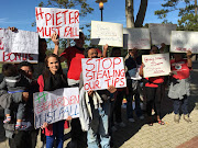 Family and colleagues of the Shoprite Seven outside the Wynberg Magistrates Court. 