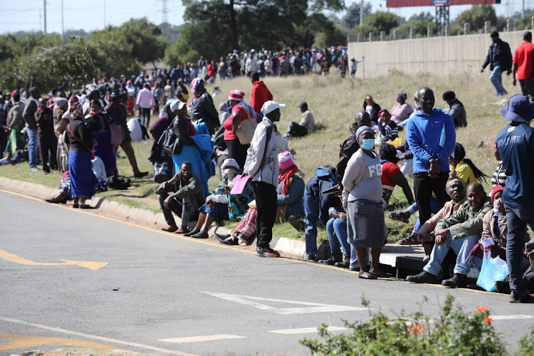 Informal traders had to brave the hot sun to get permits to run their businesses