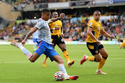 Mason Greenwood of Manchester United scores against Wolverhampton Wanderers in a Premier League match at Molineux on August 29, 2021 