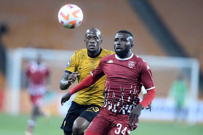 Kaizer Chiefs defender Sfiso Hlanti marking Chibuike Ohizu of Sekhukhune United during their DStv Premiership match at FNB Stadium on January 07, 2023 in Johannesburg, South Africa.