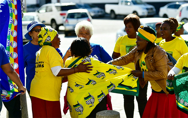 ANC and DA supporters outside the court yesterday