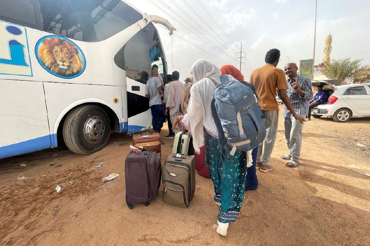 People flee clashes between the paramilitary Rapid Support Forces and the army in Khartoum.